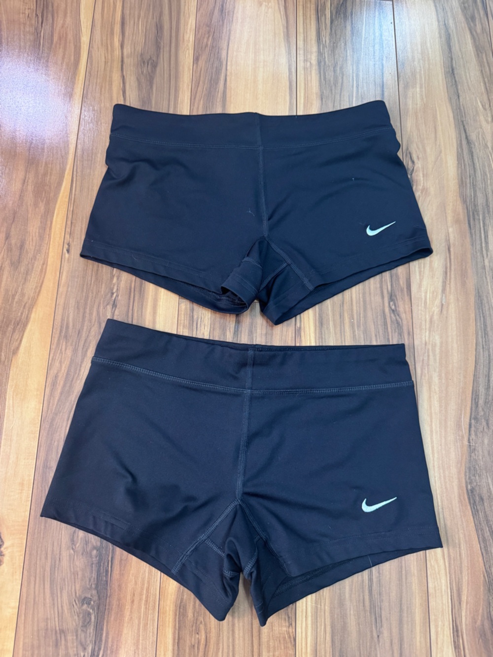 Nike  Black Athletic Shorts with White Swoosh